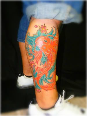 Nick Franco's Koi fish on his outer right calf. Beautiful color and amazing 