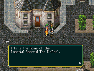Soldier in green outside of their giant house.