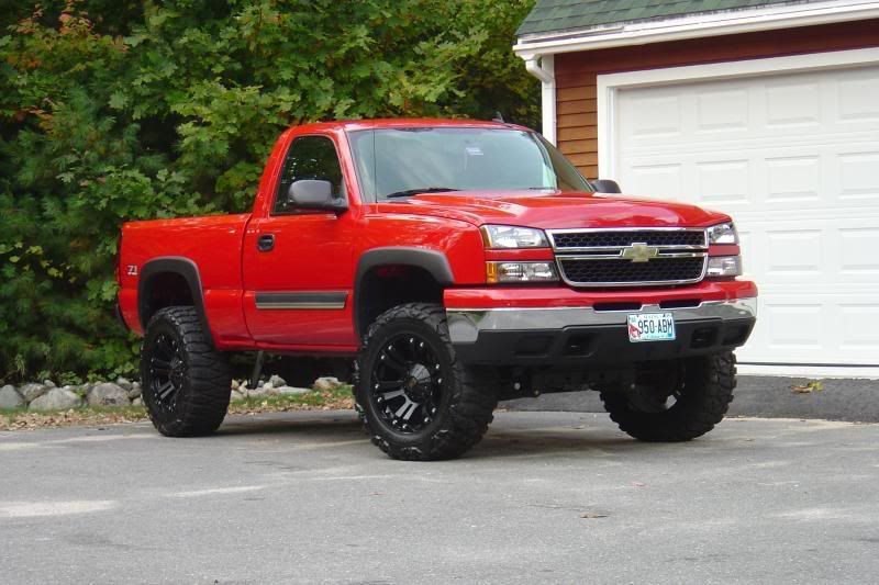 Red truck black wheels mean look I know its a chevy but it is nice