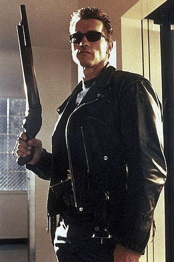 http://i53.photobucket.com/albums/g64/PoorOldSpike/arnie-shotgun2_zps57556d65.jpg~original