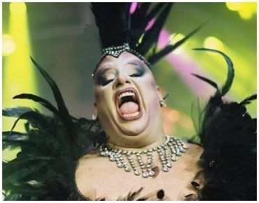 http://i53.photobucket.com/albums/g68/turtellgurl/singingdragqueen.jpg