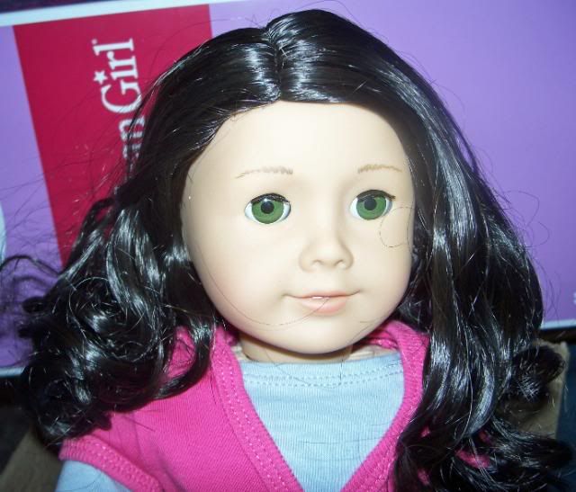 dark curly hair green eyes. messy the doll#39;s hair got.