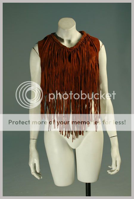   vest top long fringe from braided trim at neck sleeveless metal snaps