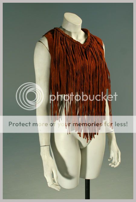   vest top long fringe from braided trim at neck sleeveless metal snaps